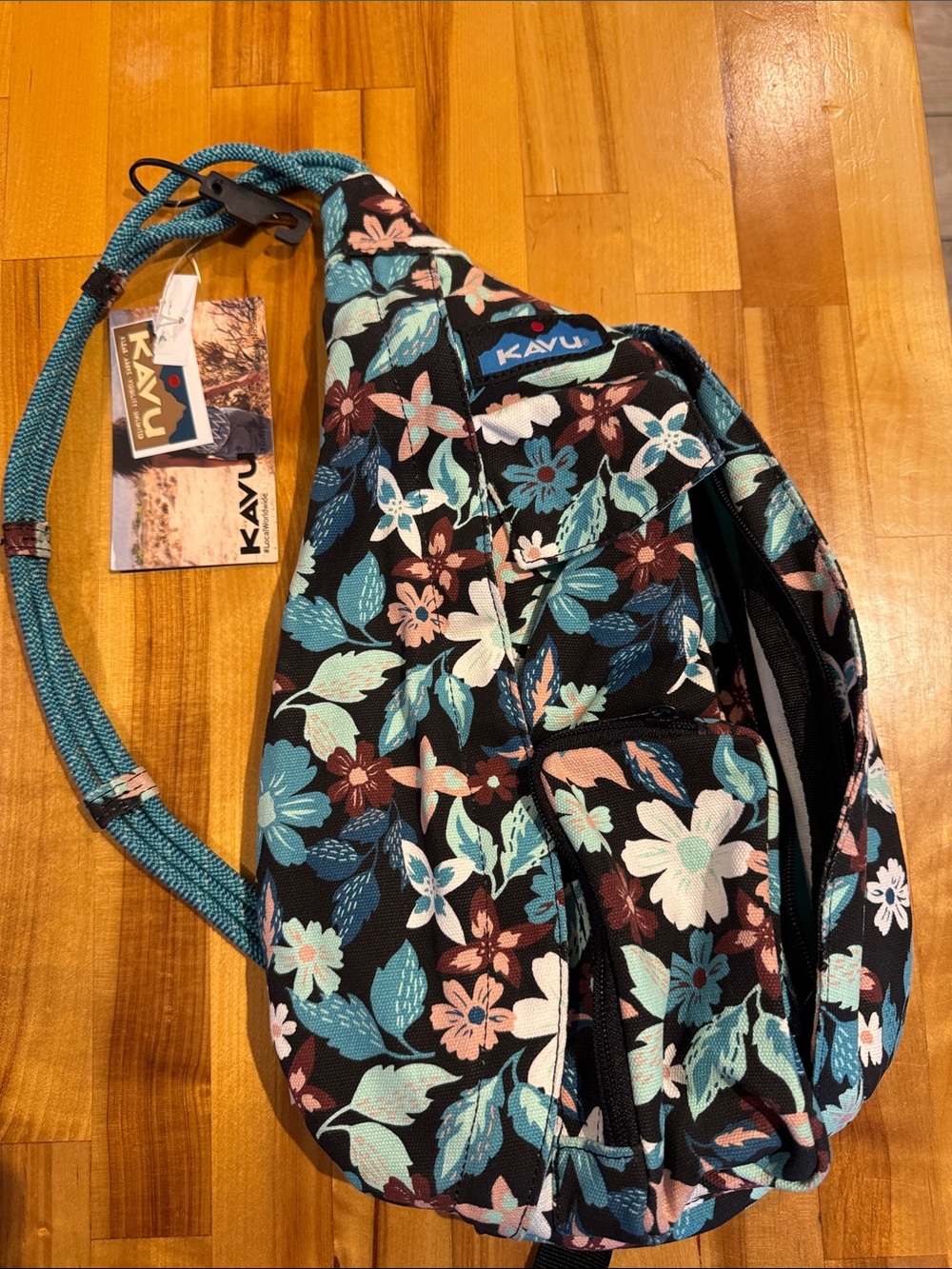 Kavu Black Crossbody Sling Bag with Teal and Pink Floral Print